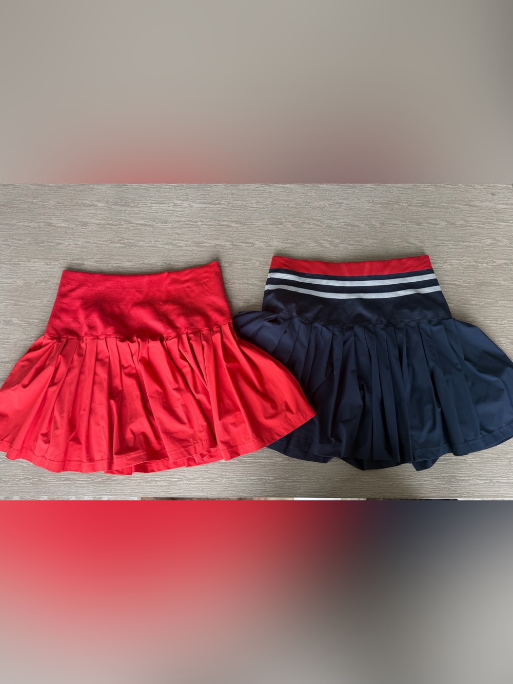 Wilson Women’s Pleated Mini Skirts - set of 2 : Red and Navy